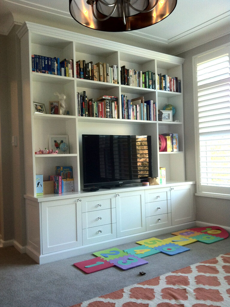 Custom joinery bookcase with draws